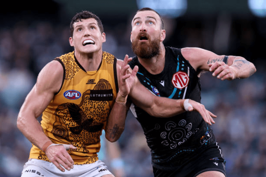 Lloyd Meek taking on Charlie Dixon - Photo by James Elsby via AFL Photos