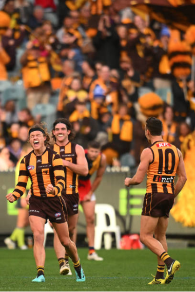 Ginnivan celebrates a goal against the Crows - Photo Morgan Hancock via Getty Images