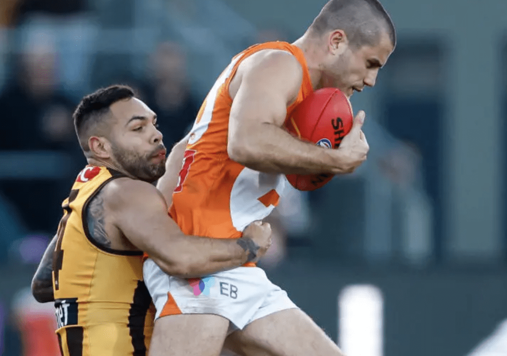 Jars tackles Xavier O'Halloran in the Round 13 match against the GWS GIANTS at UTAS Stadium.